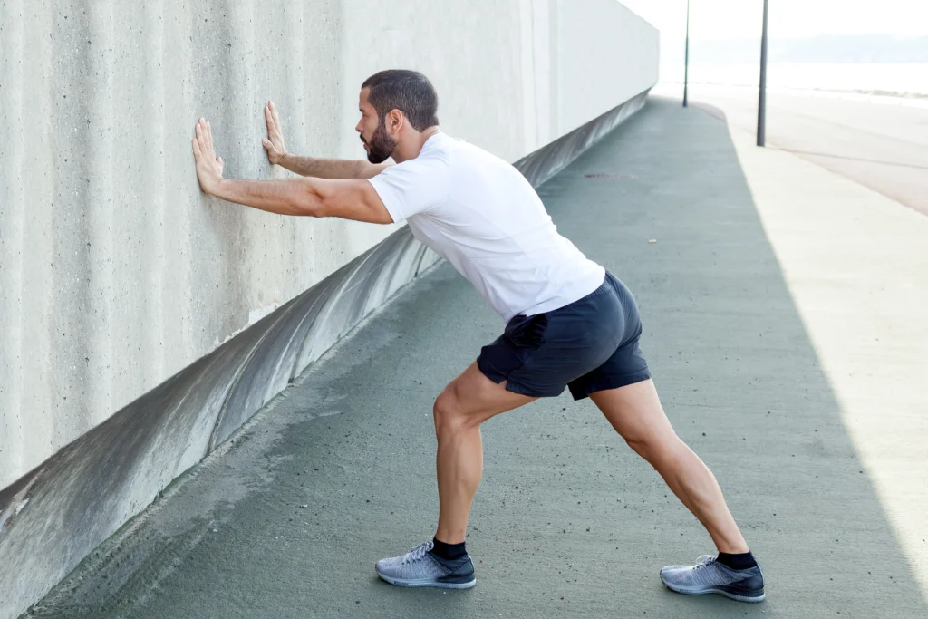 Calf Stretch Against Wall- ankle range of motion exercises