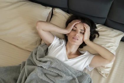 why do I get headache after oversleeping